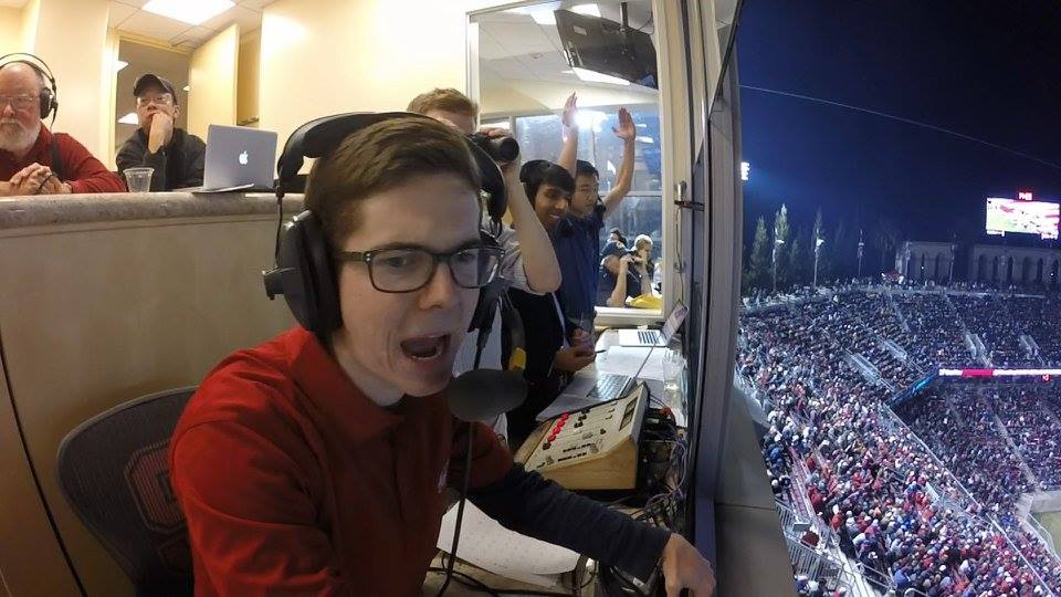Michael broadcasting from the booth at Stanford